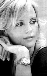 Copy of a picture that features Charlize Theron wearing the watch that has caused the controversy.